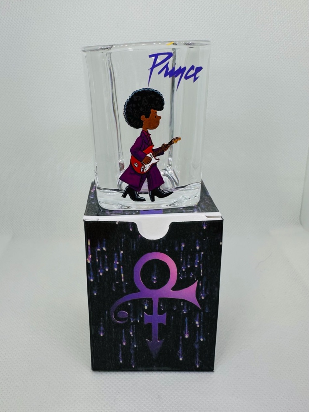 Prince “Peanuts” set of 4 shot glasses/matching gift boxes.